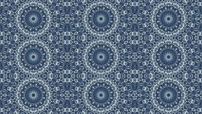 Ornate light blue kaleidoscopic pattern with three lines of fantasy rings. Moving background with meditative and hypnotic effect. Abstract fractal animation. Seamless loopable. HD video clip.
