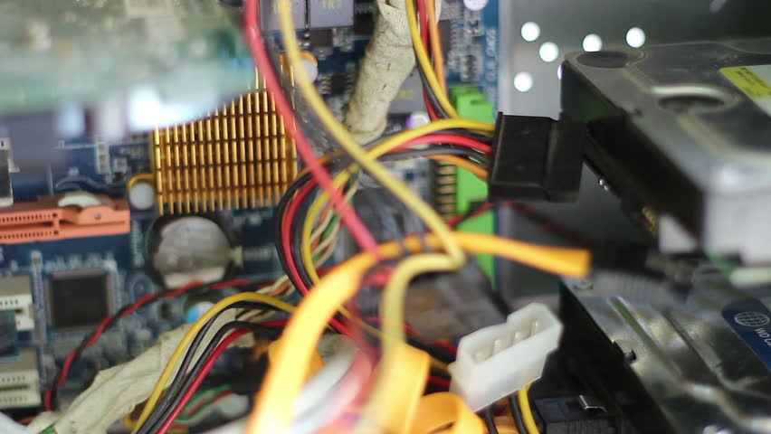 Mounting the power cable(SATA version) to a HDD. The SATA standard specifies a power connector that differs from the decades-old four-pin Molex connector found on pre-SATA devices.
