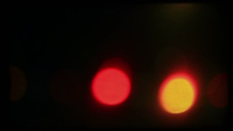 Night road lights. Retro color film background, loop, HD