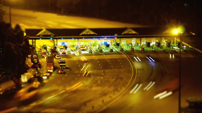 Vehicles queuing at Toll Plaza at Kuala Lumpur, Malaysia circa December 2014.
Timelapse With Miniature Diorama Tilt Shift Effect 