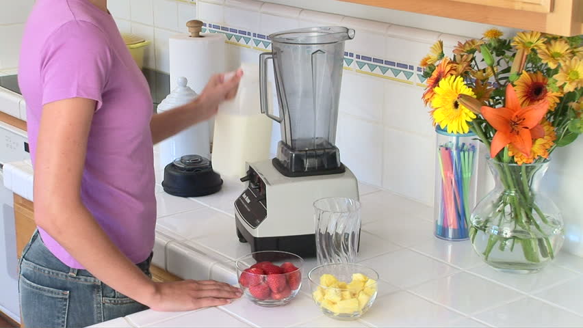 Woman Using Blender In Kitchen Stock Footage Video 100 Royalty Free 894781 Shutterstock