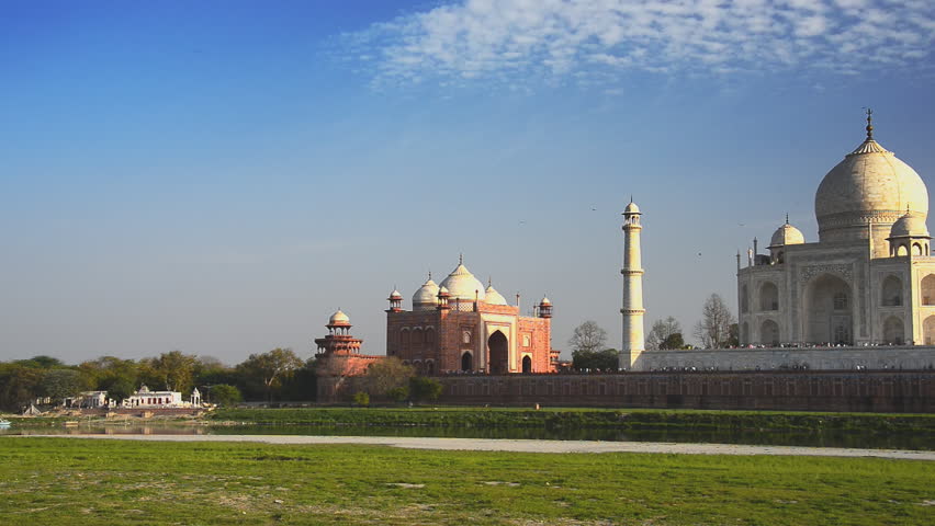 Taj Mahal seen over river Yamuna, panning right.