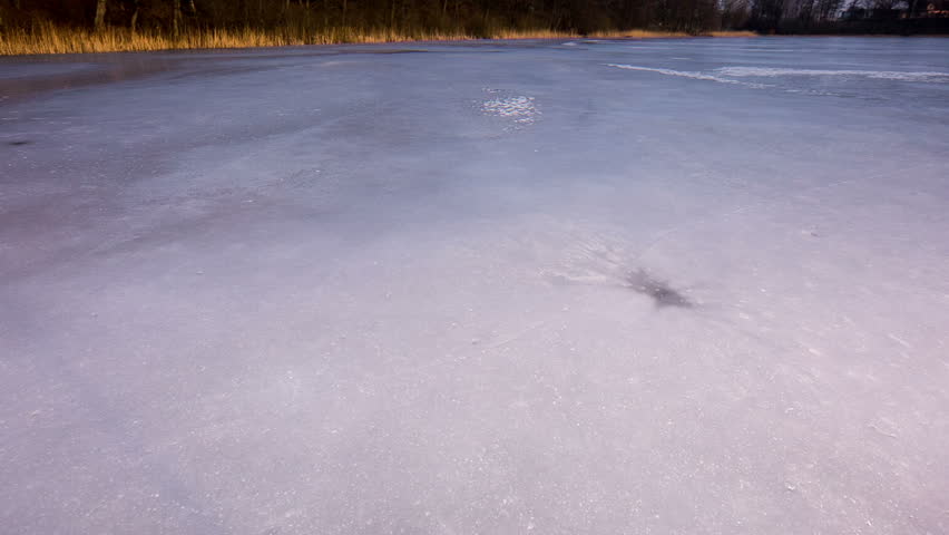 View of Frozen Lake at sunrise