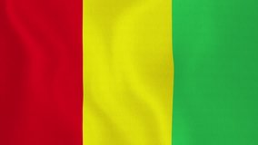 [loopable] Flag of Guinea. Guinean official flag gently waving in the wind. Highly detailed fabric texture for 4K resolution. 15 seconds loop. Source: CGI rendering. Clip ID: ax665c