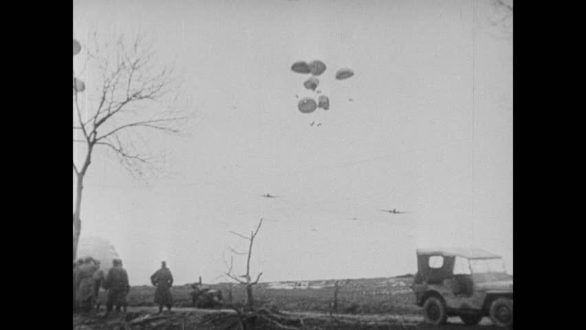 Douglas C-47 Skytrain drops a gasoline supply for the Allies battling at the Rhine during the Western European Campaign of WWII, France circa middle of February 1944. Gasoline breaks and cause a fire