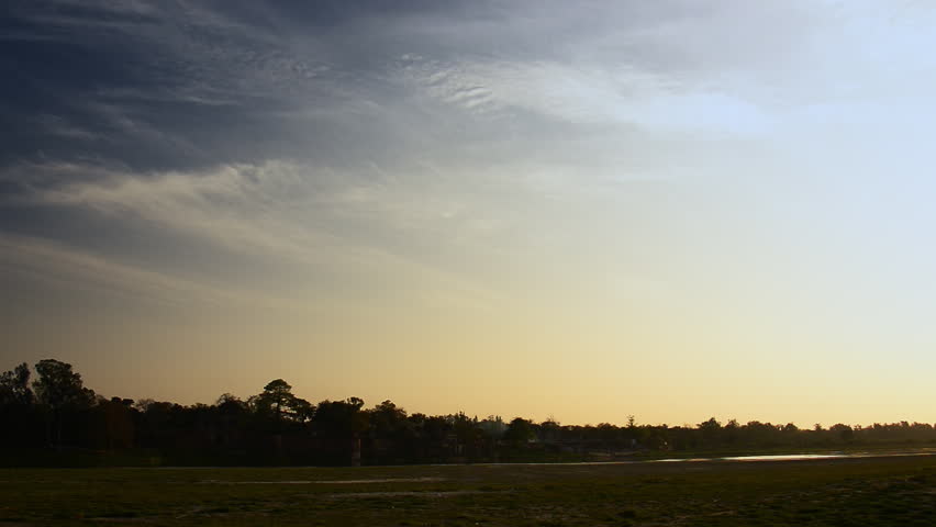 Wide shot of Taj Mahal, panning left