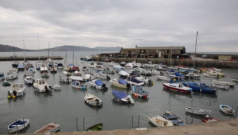Boats in Lyme Regis Dorset England UK English Channel south coast on the Jurassic Coast a World Heritage Site