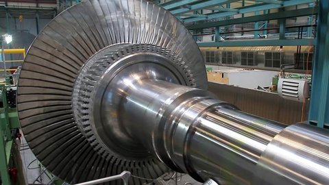 Rotation of a turbine at a plant producing power steam turbines 