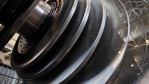Power steam turbine rotates at a heavy industry plant producing power steam turbines and power steam turbine blades
