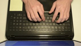 Close-Up Man Typing On Keyboard Top View