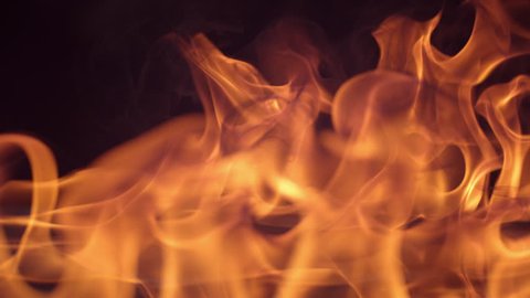 Closeup of fire burning on black background in slow motion; shot on Phantom Flex 4K at 1000 fps Stock Video