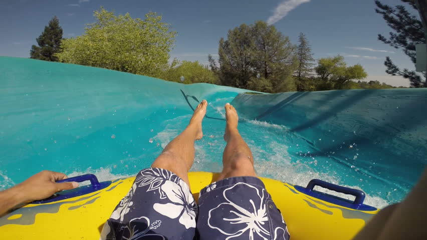 Going down a waterslide at waterpark, POV video