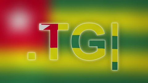 TG - internet domain of Togo. Typing top-level domain “.TG” against blurred waving national flag of Togo. Highly detailed fabric texture for 4K resolution. Source: CGI rendering. Clip ID: ax1046c