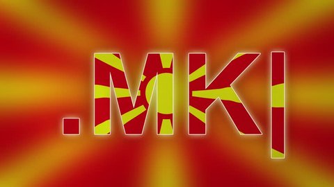 MK - internet domain of Macedonia. Typing top-level domain “.MK” against blurred waving national flag of Macedonia. Highly detailed fabric texture for 4K resolution. Clip ID: ax1058c