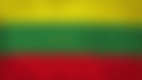 LT - internet domain of Lithuania. Typing top-level domain “.LT” against blurred waving national flag of Lithuania. Highly detailed fabric texture for 4K resolution. Clip ID: ax951c