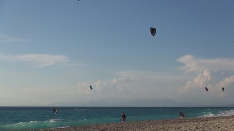 GREECE, LEFKADA, JULY 14, 2014: HD Kite surfer. Kitesurfers. Kitesurfing. Sea surfers. Kitesurfer. Wind and sun.