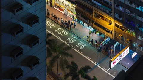 hong kong - october 2014: night light traffic block 4k time lapse from hong kong, china.