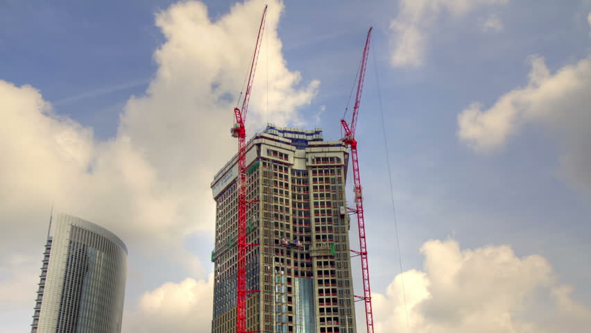 construction site with 2 cranes - Time lapse