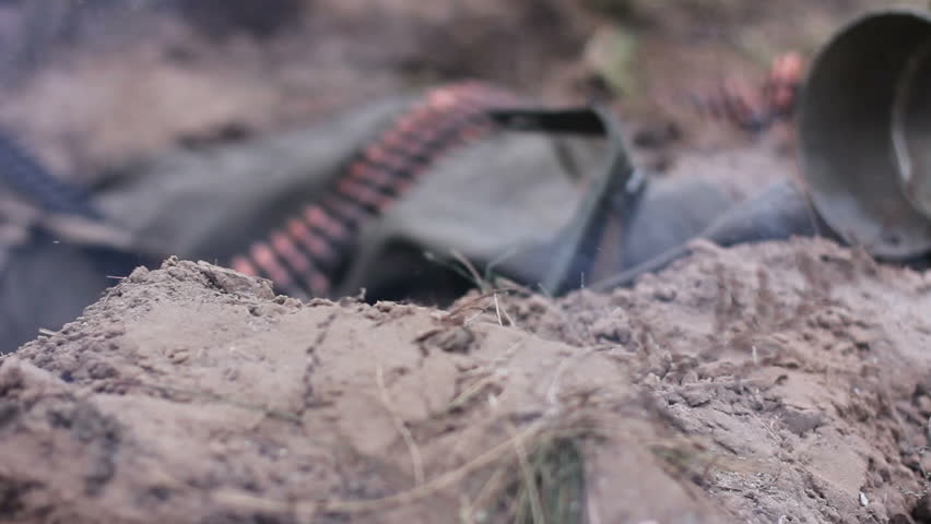 DNIPROPETROVSK, UKRAINE -9 DECEMBER, 2013:  Inverted machine gun after explosion during historical reconstruction of 1943 WWII on December 9, 2013 in Dnipropetrovsk, Ukraine