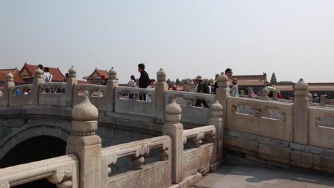 BEIJING CHINA- May 2014: Tourists inside the ancient Forbidden City in Beijing China