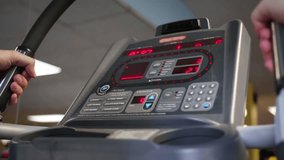 Male hands hold handles of racetrack simulator with dashboard. - Powered by Shutterstock - Get 15% off with code: PIKWIZARD15