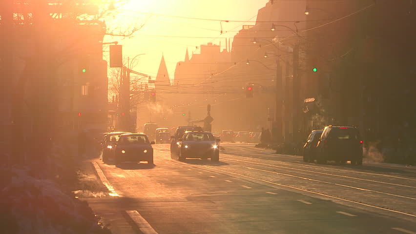 Dusty downtown urban city streets of Toronto near sunset