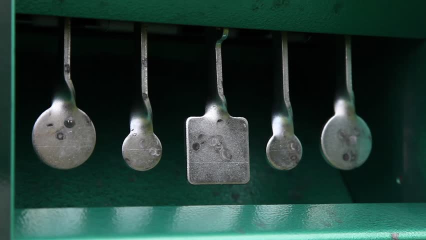 Hidden man shooting at the target