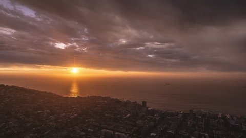 4K Timelapse 4096x2304 UHD of Cape Town City, Seapoint Suburbs as the sun sets, from day to night with moving clouds from Signal Hill. Holy grail time lapse shot in Cape Town South Africa