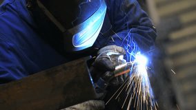 Closeup of steel being heated in workshop