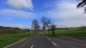 Driving on an alley, Bavaria, Germany - Driving shot with roof mounted Camera.
Series of clips, one after the other cuttable.