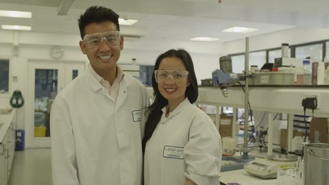 4K Portrait of young scientists with science team in lab Video Stok