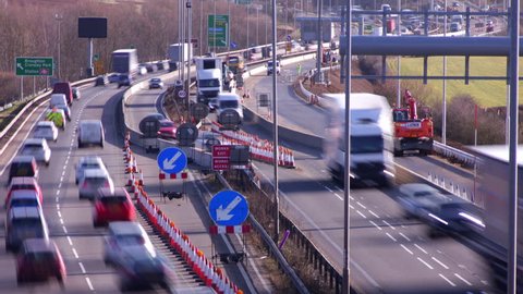 Northamptonshire, UK - March 02, 2015: Time lapse of road traffic flowing through a contraflow at the almost complete road widening road works on the A14 dual carriageway.