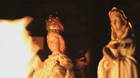 Ave Maria Statue with burning flames