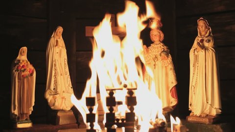 Ave Maria Statues with burning flames