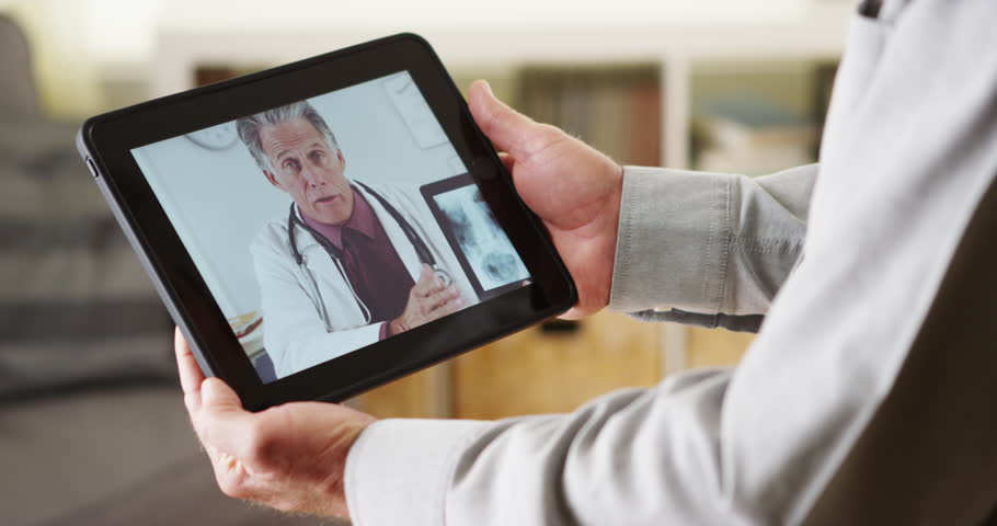 Doctor talking to patient online about xrays Royalty-Free Stock Footage #9060286