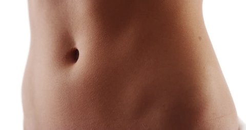 Closeup of healthy fit woman flat stomach