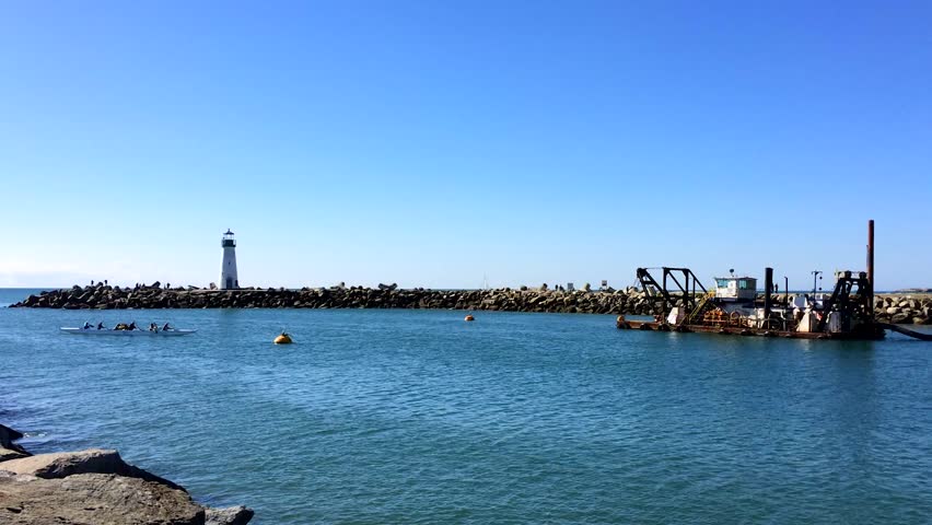 Santa Cruz, The Santa Cruz Harbor  at the Twin Lakes State Beach. Twin Lakes is popular for all kinds of water activities from surfing and boogie boarding to stand-up paddle boarding and kayaking. 
