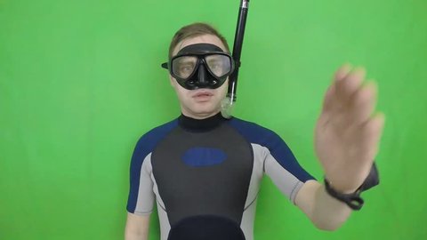 Diving sign- divemaster  shows sing  ,also a available on the green screen all of diving sings from course (open water diver)