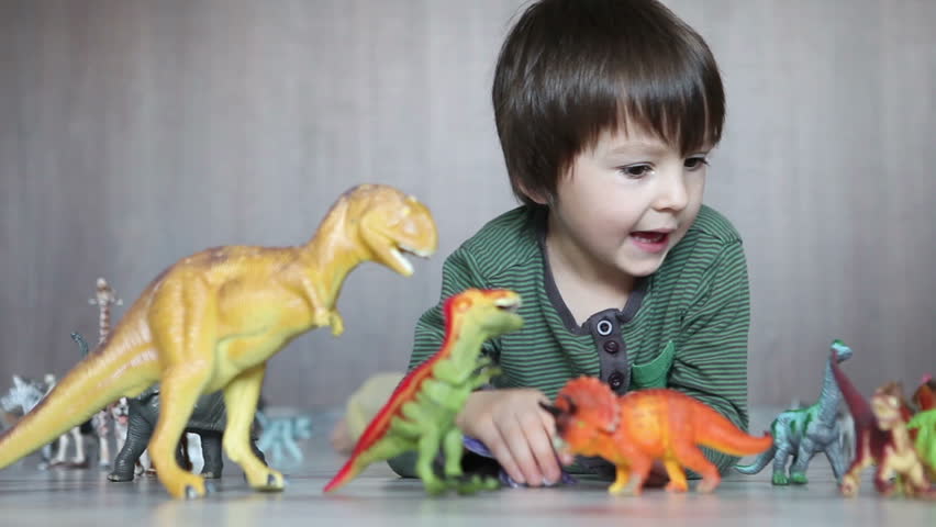 playing with toy animals