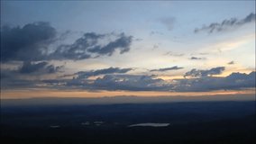 Sunrise from the mountains in the clouds timelapse video
