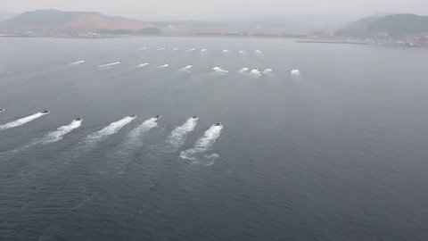 CIRCA 2010s - Aerials over a massive amphibious simulated invasion by the U.S. Marines off the coast of Korea.
