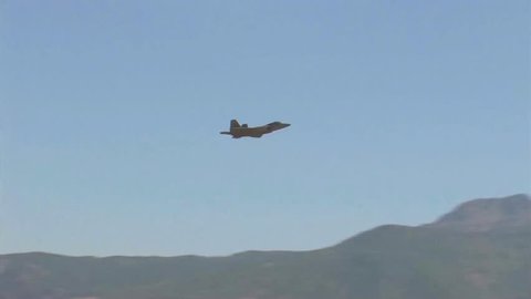 CIRCA 2010s - An F-35 Lightning bombs targets in the desert.