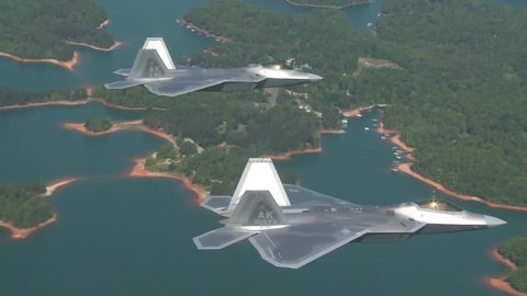 CIRCA 2010s - Aerials of the U.S. Air Force Air Mobility Command F-35 Lightnings in flight.