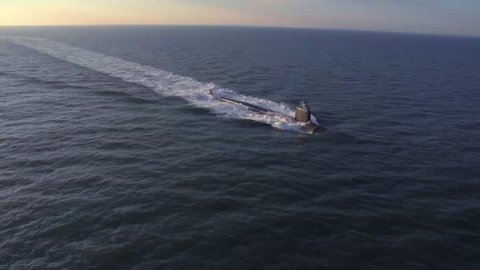 CIRCA 2010s - Excellent aerials over a submarine at sea.