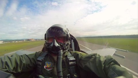 CIRCA 2010s - POV shots from the cockpit of a fighter plane doing barrel rolls.