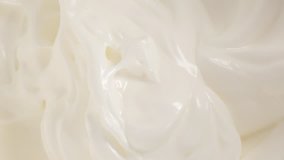 Beaten egg whites slow tilting over 4K 2160p UHD footage - Whipped egg white cream for cake preparing 4K 3840X2160 UHD video