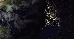 Planet Earth from space. Northern hemisphere close-up (America, Europe, Asia). Day and night city lights. Moving clouds. Steady starry sky background. Clip ID: ax1122c