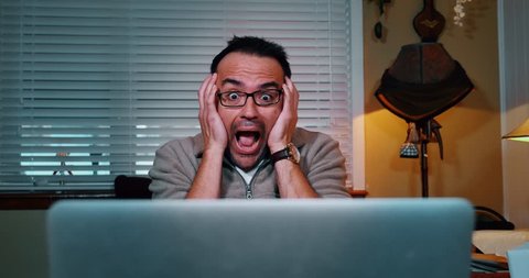 A shocked man looks at his laptop computer.  Multiple options.