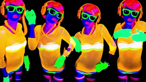 sexy female disco dancer poses in UV costume
