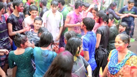 MUMBAI, MAHARASHTRA, INDIA - March 6, 2015: people playing Holi festival